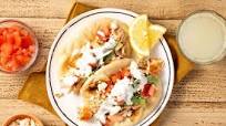 Greek-Style Salmon Gyros with creamy tzatziki and feta Greek-Style Salmon Gyros with creamy tzatziki and feta