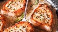 Boneless Pork Chops in Creamy Garlic and Herb Wine Sauce Boneless Pork Chops in Creamy Garlic and Herb Wine Sauce