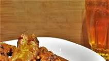 Sticky oven-baked pork spare ribs with honey glaze Sticky oven-baked pork spare ribs with honey glaze