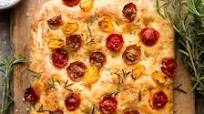 Vegan focaccia with tomatoes and rosemary Vegan focaccia with tomatoes and rosemary