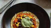 Cheesy Sweet Potato Tostadas with Black Beans, Corn, and Avocado Crema Cheesy Sweet Potato Tostadas with Black Beans, Corn, and Avocado Crema