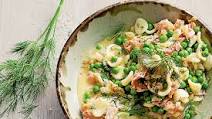 Orecchiette with hot-smoked salmon, peas and beurre blanc sauce Orecchiette with hot-smoked salmon, peas and beurre blanc sauce