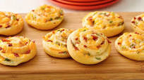 Bacon-Cheddar Pinwheels Bacon-Cheddar Pinwheels