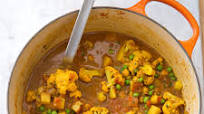Indian-Style Curry with Potatoes, Cauliflower, Peas, and Chickpeas Indian-Style Curry with Potatoes, Cauliflower, Peas, and Chickpeas