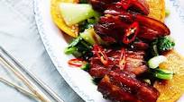 Caramelised pork belly in Chinese master stock with chilli and orange Caramelised pork belly in Chinese master stock with chilli and orange