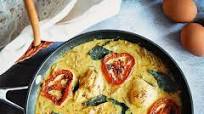 Poached egg moilee with roasted tomatoes Poached egg moilee with roasted tomatoes