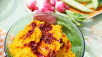 Carrot & cumin hummus with swirled harissa Carrot & cumin hummus with swirled harissa