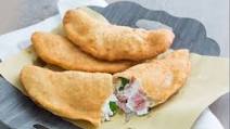Fried pizza with mortadella and fior di latte cheese Fried pizza with mortadella and fior di latte cheese