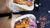 Greek Style Roasted Lamb Gyros with Harissa Spiced Tzatziki. Greek Style Roasted Lamb Gyros with Harissa Spiced Tzatziki.