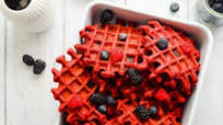 Red Velvet Waffles with Cream Cheese Whipped Cream topping Red Velvet Waffles with Cream Cheese Whipped Cream topping