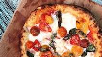 Pizza With Cherry Tomatoes, Garlic, Basil, and Mozzarella Recipe Pizza With Cherry Tomatoes, Garlic, Basil, and Mozzarella Recipe