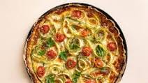 Cheesy cauliflower pizza with shaved asparagus Cheesy cauliflower pizza with shaved asparagus