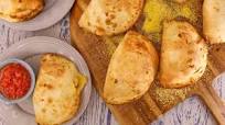 Mini Sausage, Mushroom and Cheese Calzones Mini Sausage, Mushroom and Cheese Calzones