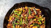 Crispy Pork Shoulder Hash With Charred Asparagus and Serrano Chile Recipe