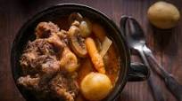 South African Oxtail Potjiekos with Morogo dumplings South African Oxtail Potjiekos with Morogo dumplings