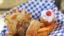 Deep-Fried Bacon-Burger Dog Slider on a Stick Deep-Fried Bacon-Burger Dog Slider on a Stick