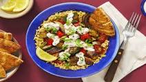 Veggie Couscous Bowl with Creamy Feta Sauce & Garlic Pita Chips Veggie Couscous Bowl with Creamy Feta Sauce & Garlic Pita Chips