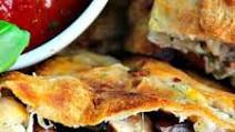 Italian Sausage and Mushroom Calzone Italian Sausage and Mushroom Calzone