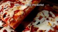 Pizza in teglia o Focaccia fatta in casa Pizza in teglia o Focaccia fatta in casa