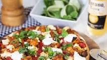Tandoori Chicken Pizza with Greek Yoghurt & Cucumber Tandoori Chicken Pizza with Greek Yoghurt & Cucumber