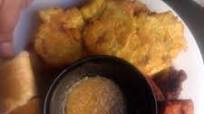 Carnitas fritas con tostones garlic sauce and long bread... Carnitas fritas con tostones garlic sauce and long bread...