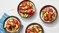 Tomato & Cucumber Salad over Garlic-Dukkah Yogurt Tomato & Cucumber Salad over Garlic-Dukkah Yogurt