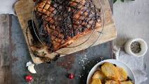 Roast pork belly with potatoes and cranberry sauce Roast pork belly with potatoes and cranberry sauce