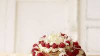 Three-tier white chocolate and raspberry cheesecake Three-tier white chocolate and raspberry cheesecake