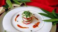 Insalata Caprese A Classic Italian salad of mozzarella cheese, tomatoes, basil and olive oil Insalata Caprese A Classic Italian salad of mozzarella cheese, tomatoes, basil and olive oil
