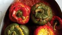 Bell Peppers Stuffed with Rice in Tomato Sauce (Pimientos Rellenos de Arroz con Salsa de Tomates) Bell Peppers Stuffed with Rice in Tomato Sauce (Pimientos Rellenos de Arroz con Salsa de Tomates)