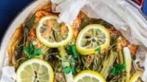 Mediterranean-Style Steamed Salmon with Lemon and Fresh Herbs Mediterranean-Style Steamed Salmon with Lemon and Fresh Herbs
