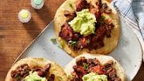 Mexico City Chicken Tinga Tostadas with Avocado & Refried Beans Mexico City Chicken Tinga Tostadas with Avocado & Refried Beans