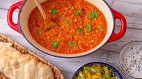 Indian daal with chick peas, raita, naan bread and mango salad Indian daal with chick peas, raita, naan bread and mango salad