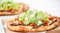 Caesar Salad Pizza with portobello mushrooms and mozzarella Caesar Salad Pizza with portobello mushrooms and mozzarella