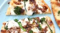 Roasted Garlic Naan Pizza with Sausage and Broccolini Roasted Garlic Naan Pizza with Sausage and Broccolini