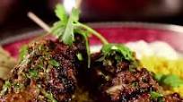 Moroccan Beef Kebabs with Curried Couscous, Raita and Charmoula Vinaigrette Moroccan Beef Kebabs with Curried Couscous, Raita and Charmoula Vinaigrette
