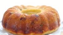 Baba au Rhum with cream and strawberries Baba au Rhum with cream and strawberries