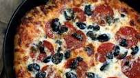 Pizzeria-style deep dish pizza Pizzeria-style deep dish pizza