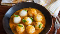 Steamed rice dumpling in Onion Gravy Steamed rice dumpling in Onion Gravy