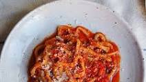 Hand-rolled pici with a simple tomato garlic sauce Hand-rolled pici with a simple tomato garlic sauce