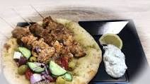 Greek Pork Souvlaki with Greek Salad and Flatbread Greek Pork Souvlaki with Greek Salad and Flatbread