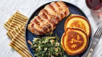 Southern Pork Chops & Crispy Corn Cakes with Braised Apple & Kale Southern Pork Chops & Crispy Corn Cakes with Braised Apple & Kale