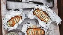 Grill-Baked Potatoes with Chive Butter Grill-Baked Potatoes with Chive Butter