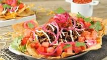 Ultimate Beef Nachos With Creamy Mexican Cheese, Salsa, and Pickled Onions Ultimate Beef Nachos With Creamy Mexican Cheese, Salsa, and Pickled Onions
