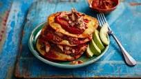 Sardines in tortillas with spicy tomato sauce and refried beans Sardines in tortillas with spicy tomato sauce and refried beans