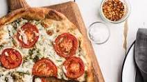 Pizza with Pesto, Fresh Tomatoes, and Mozzarella Pizza with Pesto, Fresh Tomatoes, and Mozzarella