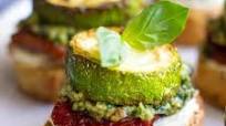Bruschetta With Pesto And Sun-Dried Tomatoes Bruschetta With Pesto And Sun-Dried Tomatoes