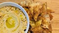homemade hummus with toasted pita chips homemade hummus with toasted pita chips