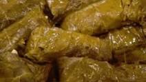 DOLMADES WITH LAMB & RICE: GRAPE LEAVES STUFFED WITH LAMB AND RICE DOLMADES WITH LAMB & RICE: GRAPE LEAVES STUFFED WITH LAMB AND RICE