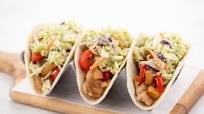 Hawaiian-Style Pork Tacos with cilantro crema slaw and pineapple Hawaiian-Style Pork Tacos with cilantro crema slaw and pineapple